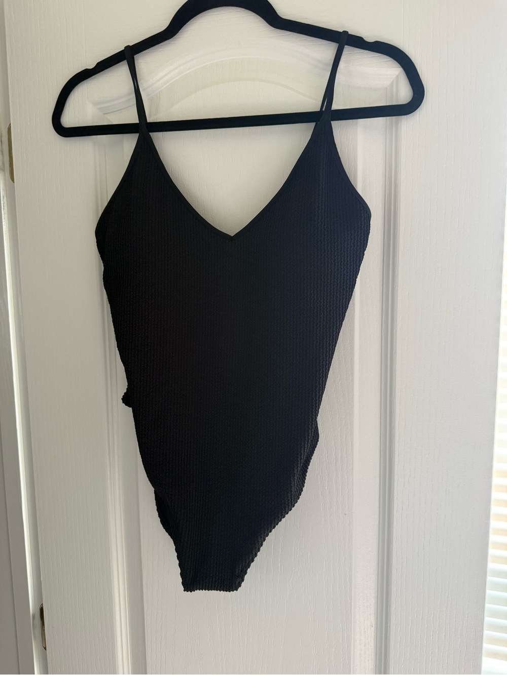 H&M Black Textured V-Neck One-Piece bathing suit. Size M, never worn; tags on